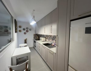 Apartament modern de inchiriat, 2 bai, terasa si parcare subterana