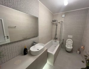 Apartament modern de inchiriat, 2 bai, terasa si parcare subterana